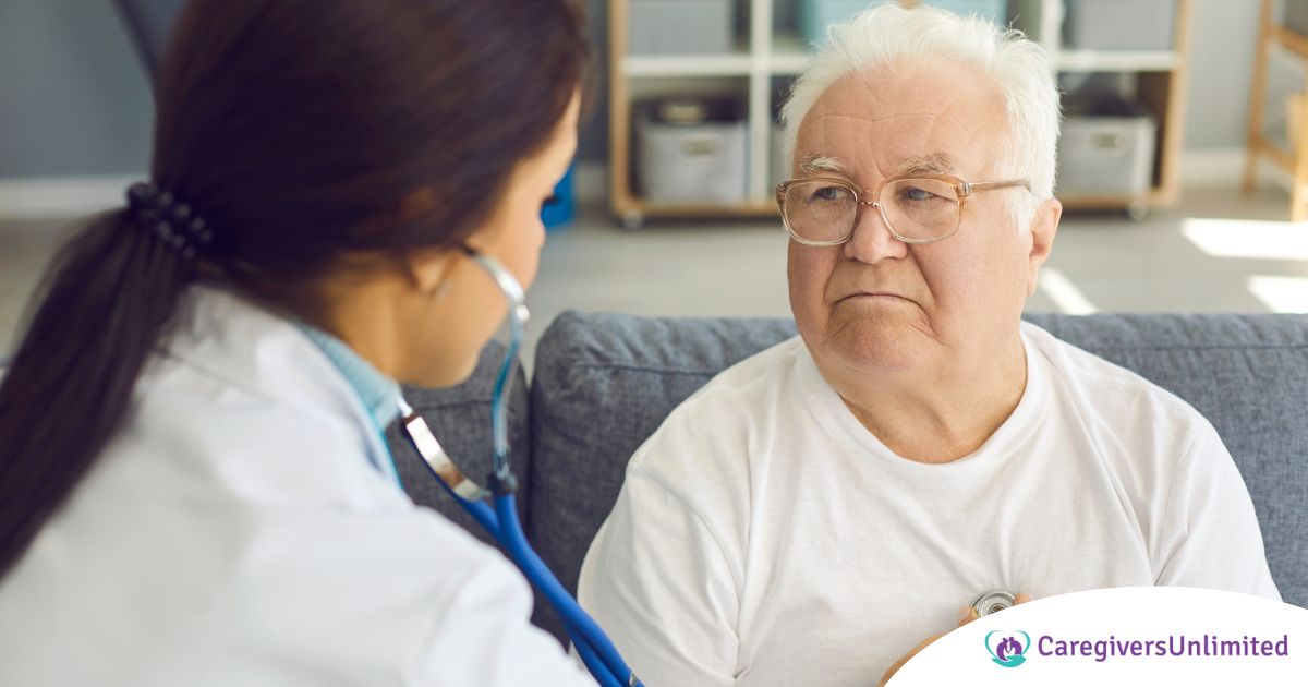 A doctor examines an older man with a stethoscope, representing pneumonia in elderly adults.