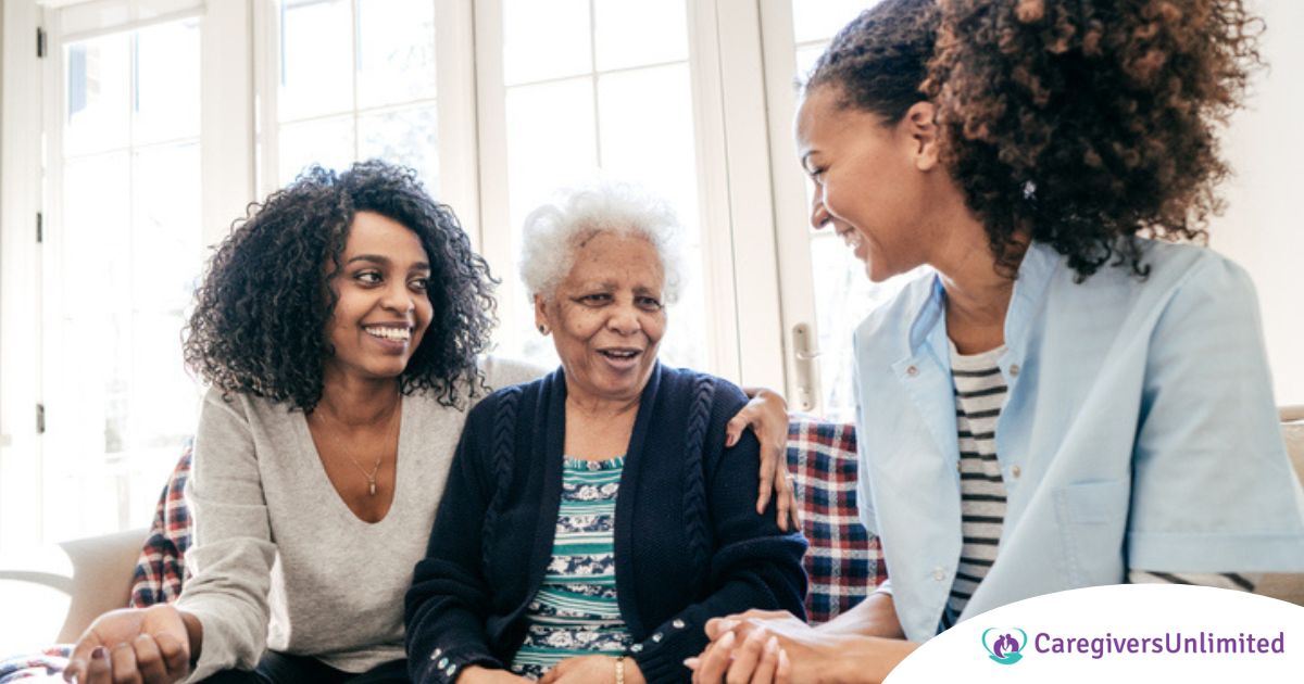 Caregiver talking to a family about Elderly Care