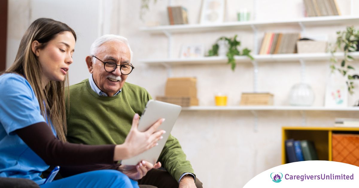 Home caregiver assisting senior man to use telehealth and senior care