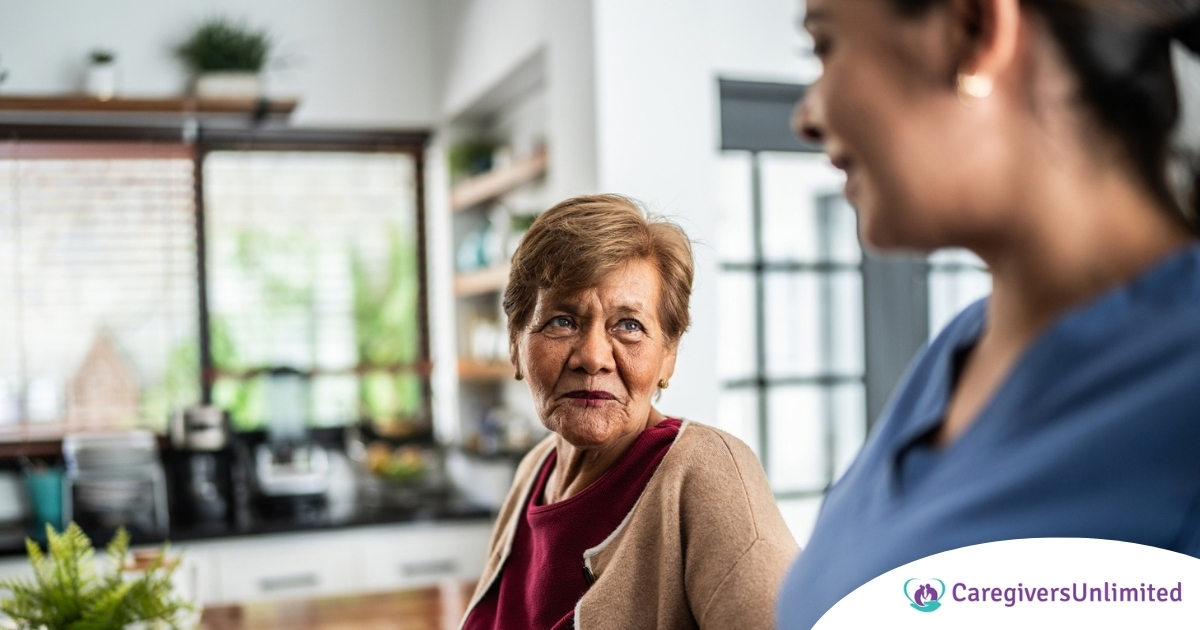 Caregiver provides attentive senior care as part of diabetes awareness